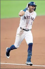  ?? Sean M. Haffey / Getty Images ?? The Astros’ Carlos Correa rounds third base after hitting a walk-off home run against the Rays in Game 5 of the ALCS on Thursday at Petco Park in San Diego.