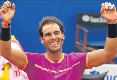  ?? Picture: AP. ?? Rafael Nadal celebrates his history-making 10th Barcelona Open title.