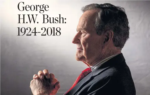  ?? DAVID HUME KENNERLY GETTY IMAGES FILE PHOTO ?? George H.W. Bush’s four years in the Oval Office, from 1989 to 1993, saw the Cold War end, the Berlin Wall fall and much of NAFTA hammered out.