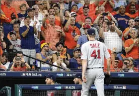  ?? DAVID J. PHILLIP / ASSOCIATED PRESS ?? Astros fans react Thursday afternoon atMinute Maid Park as Boston Red Sox starting pitcher Chris Sale is pulled during the sixth inning of Game1 in theirAL Division Series.