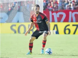  ?? M. manera ?? Quignon, clase en el medio campo de newell’s