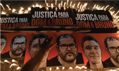  ?? Photograph: Nelson Almeida/AFP/Getty Images ?? Posters depicting Dom Phillips and Bruno Pereira are used in a protest by Brazilian Indigenous people in São Paulo on 23 January 2023.