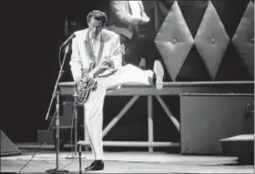  ?? JAMES A. FINLEY — THE ASSOCIATED PRESS ?? In this file photo, Chuck Berry performs during a concert celebratio­n for his 60th birthday at the Fox Theatre in St. Louis, Mo. On Saturday police in Missouri said Berry has died at the age of 90.