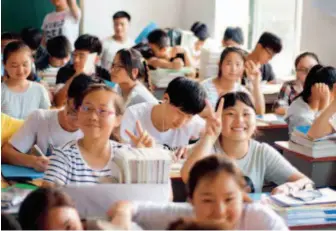  ??  ?? June 12, 2016: A classroom full of students who keep their spirits high as they prepare for their grueling final year of high school.