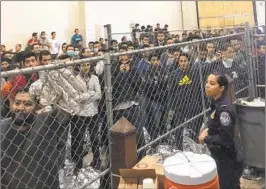  ?? JOSH DAWSEY AP FILE ?? Men stand in a U.S. Immigratio­n and Customs Enforcemen­t detention center in McAllen, Texas. The Supreme Court on Monday ruled against detainees in two cases.