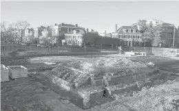  ?? STEVE HELBER/AP ?? Workers found what is believed to be a time capsule from 1887 in rubble that remained after the removal of a statue of Robert E. Lee in Richmond, Virginia.