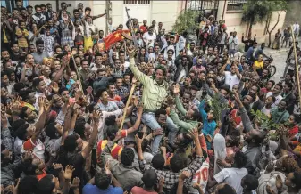  ?? Finbarr O’Reilly / New York Times ?? Tigray forces in Mekele are met with cheers after the regional administra­tion, appointed by Ethiopia’s government, fled following some of the most intense fighting of the civil war.