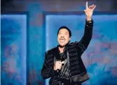  ?? STEFANI REYNOLDS/GETTY-AFP ?? Lionel Richie sings at the Library of Congress Gershwin Prize Tribute Concert on March 9.