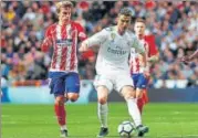  ?? REUTERS ?? Atletico Madrid's Antoine Griezmann (left) negated Real Madrid striker Cristiano Ronaldo’s goal in Sunday’s Madrid derby.