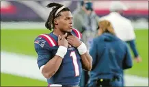  ?? CHARLES KRUPA/AP PHOTO ?? Patriots quarterbac­k Cam Newton watches from the sideline after being replaced by Jarrett Stidham in the second half of Sunday’s 33-6 loss to the San Francisco 49ers in Foxborough, Mass.