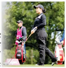  ??  ?? Moriya Jutanugarn, of Thailand, follows her ball after a teeshot on the 18th hole during the second round of the Evian Championsh­ip women’s golf tournament in Evian, eastern France, Saturday. (AP)