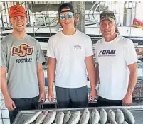  ?? TWITTER ?? A photo of OSU coach Mike Gundy, right, sporting the logo of a far-right news network triggered a backlash among players.