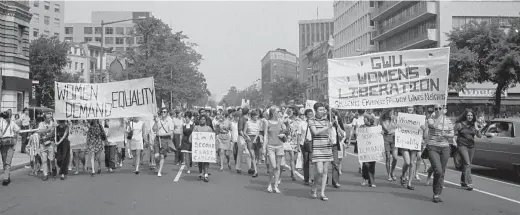  ??  ?? FOOTSTEPS ON THE GROUND The Women’s Liberation Movement featured political activities such as a march demanding legal equality for women in the United States (Aug. 26, 1970)