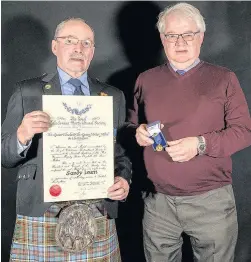  ??  ?? Award Sandy (right) with George Anderson, RCHS honorary president