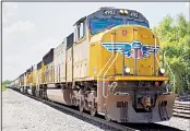  ??  ?? In this file photo, a Union
Pacific train travels through
Union, Nebraska, Union
Pacific Corp reports financial results Jan
23. (AP)