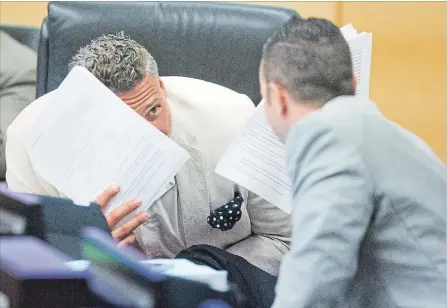  ?? BOB TYMCZYSZYN THE ST. CATHARINES STANDARD ?? Fort Erie councillor Sandy Annunziata and Port Colborne councillor David Barrick talk during a Niagara Regional council meeting.