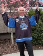  ?? Okanagan Newspaper Group ?? Penticton Mayor John Vassilaki poses in his Penticton Vees jersey outside city hall. Tonight, the Vees host the Nanaimo Clippers.