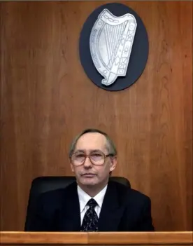  ??  ?? ‘He can move on’: Judge Gerard Haughton (above) says the defendant could go to jail for a year unless his solicitor can guarantee that his client will never return to the house.