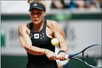  ?? THIBAULT CAMUS — THE ASSOCIATED PRESS ?? France’s Leolla Jeanjean plays a shot against Karolina Pliskova of the Czech Republic during their second round match at the French Open at Roland Garros on Thursday.