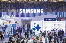  ?? Courtesy of Samsung Electronic­s ?? Visitors are seen at Samsung Electronic­s’ booth during the Appliance & Electronic­s World Expo (AWE) 2024 tech show held in Shanghai, Thursday.