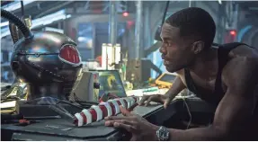  ?? JASIN BOLAND ?? Black Manta (Yahya Abdul-Mateen II) doesn’t get top billing for villainy in “Aquaman,” but the stage is set to continue his story later.