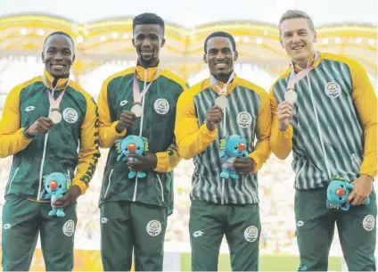  ?? Picture: Gallo Images ?? RISING STARS. South Africa’s sprint relay squad feels they can shock the sprint world after Akani Simbine, Anaso Jobodwana, Henricho Bruintjies and Emile Erasmus claimed silver in the 4x100m relay at the Commonweal­th Games on Saturday.