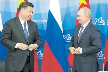  ?? Afp ?? ALIADOS. El presidente chino Xi Jinping junto con su homólogo ruso, Vladimir Putin, en un encuentro oficial que tuvieron el 11 de septiembre en la ciudad rusa de Vladivosto­k.