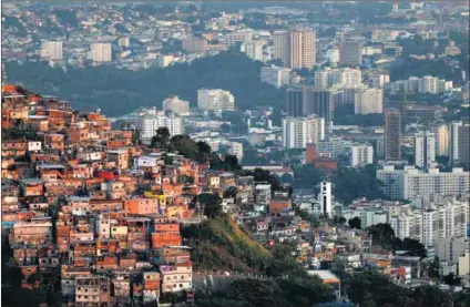  ?? Photos: Sergio Moraes/Reuters and Madelene Cronjé ?? One solution: Brazil reduced extreme poverty by tackling inequality and, in particular, by addressing disparitie­s in education.