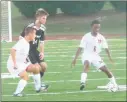  ?? STAFF PHOTO BY ANDY STATES ?? North Point’s Mason Nunn prepares to move the ball during early action in the Eagles’ game with the visiting Patuxent on Tuesday evening. Nunn scored a late goal to lift the Eagles to a 2-1 win.