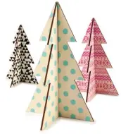  ??  ?? Miniature plywood Christmas trees R60 each Typo shop.cottonon.com/typoshop/