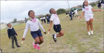  ??  ?? PUPILS at Masiphumel­ele Primary School in Khayelitsh­a yesterday celebrated World School Milk Day with fun and games.