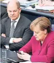  ?? FOTO: DPA ?? Finanzmini­ster Olaf Scholz und Kanzlerin Angela Merkel.