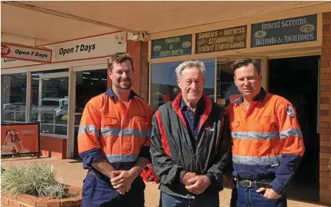  ?? PHOTO: CONTRIBUTE­D ?? FAMILY TIES: Denis (left) and Joe (right) with their dad Howard Littleton out the front of Littleton Leather in the main street of Crows Nest, opened in 1930 by their grandfathe­r.