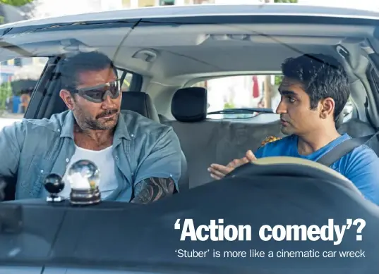  ??  ?? Dave Bautista, left, as off- duty LAPD officer Vic, conscripts Kumail Nanjiani as Stu to drive him around on his vengeance mission in “Stuber.”