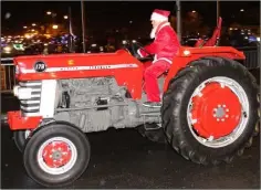  ??  ?? Santa on a Massey Ferguson.