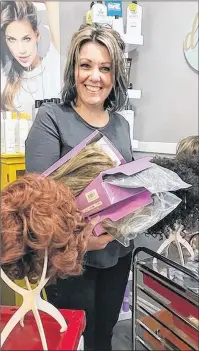  ?? SUBMITTED PHOTO ?? Carla Wilson MacKinnon shows some of the wigs that have been donated to her wig exchange. In turn, they have been sterilized and styled and provided to cancer patients.
