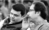  ?? PHOTO: PTI ?? Uddhav Thackeray ( left) with Devendra Fadnavis. The suspicion in the BJP is that the Sena could chalk out its own course in the post-poll scenario