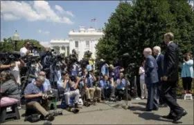  ?? PHOTOS BY THE ASSOCIATED PRESS ?? From left, Senate Majority Leader Mitch McConnell of Ky., Senate Majority Whip John Cornyn of Texas, and Sen. John Thune, R-S.D., speaks to members of the media outside of the West Wing of the White House in Washington, Wednesday, July 19, 2017,...