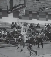  ?? PHOTO BY JERRY BALLENGEE ?? Lackey High School senior Hakeem Everett scored 22 points in Wednesday’s 5958 victory over Thomas Stone in an early season clash between Southern Maryland Athletic Conference Potomac Division rivals.