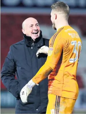  ?? Alex Livesey ?? John Coleman celebrates with goalkeeper Connor Ripley