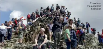  ??  ?? Crowds on the summit of Snowdon