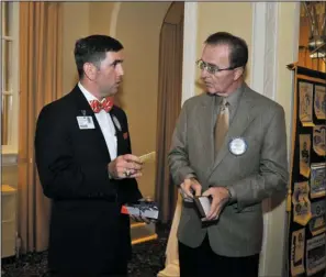  ??  ?? ROTARY VISIT: Tony Houston, president of CHI St. Vincent Hot Springs, speaks with Ernie Hinz, Hot Springs National Park Rotary Club president, following his presentati­on to the club’s weekly meeting Wednesday at the Arlington Resort Hotel & Spa.