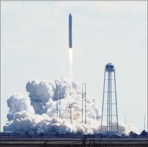  ?? Steve Helber / Associated Press ?? Northup Grumman's Antares rocket lifts off the launch pad at NASA's Wallops Island flight facility in Wallops Island, Va., on Saturday. The rocket is delivering cargo to the Internatio­nal Space Station.