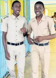  ??  ?? Junior Gooden (left) and Cyril Hinds took on the job of defending the good name of their school, Brown’s Town High.