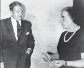  ?? FILE — THE ASSOCIATED PRESS ?? In this file photo, David Rockefelle­r, left, chairman of the Chase Manhattan Bank, talks with Israeli Prime Minister Golda Meir after his arrival in Israel. The billionair­e philanthro­pist who was the last of his generation in the famously philanthro­pic...