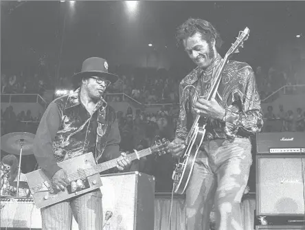  ?? Michael Ochs Archives/Getty Images ?? ‘TELL TCHAIKOVSK­Y THE NEWS’ Chuck Berry, right, performs with Bo Diddley at New York’s Madison Square Garden in 1972. He had six Top 10 hits from 1955 through ’64, and the early work of bands including the Beatles and the Rolling Stones was peppered...