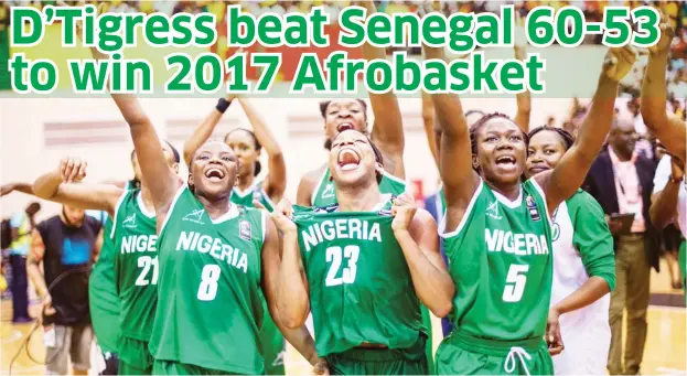  ??  ?? D'Tigress players celebratin­g after beating Senegal 60-53 to win the 2017 Afrobasket championsh­ip in Bamako Mali yesterday.