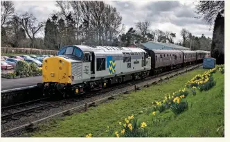  ?? DUNCAN LANGTREE. ?? Newly named 37714 arrives at Rothley on March 19, with the 1200 Leicester North-Loughborou­gh Central during the Great Central Railway diesel gala. Owned by Direct Rail Services, and hired to the Heavy Tractor Group, the ‘37/7’ is based at the GCR.