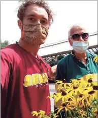  ?? Contribute­d photo ?? Dr. Parviz Mehri, right, with his grandson, Dylan Darius Mehri, in August.