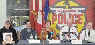  ?? CATHIE COWARD HAMILTON SPECTATOR FILE PHOTO ?? Family members, police and a Six Nations band councillor at a press conference regarding the triple homicide in Ohsweken last November. The families have released a video seeking tips from the public.